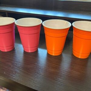 Pink.Orange plastic cups x 4